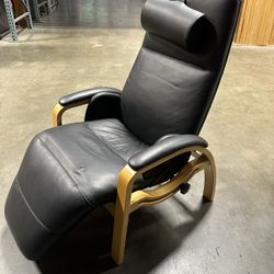 High End Scandanavian Design Chair.  Faux Leather And High Quality, Reclines In Many Positions