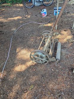 Antique cast reel mower.