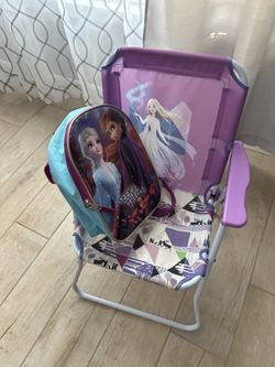 Frozen beach chair and book bag