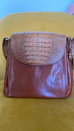 Vintage Brahmin saddle-style crossbody bag featuring smooth cognac brown leather paired with a signature crocodile-embossed leather flap.