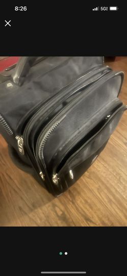 small travel bag roomy rolls on back wheels clean all zippers work 30