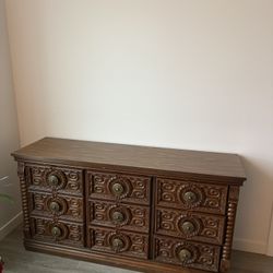 Vintage 1950s vintage nine-drawer horizontal Roman style Dresser 