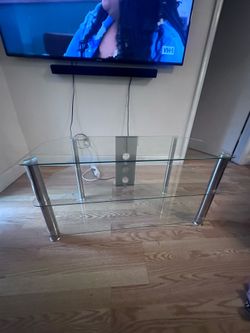 Pemberly Row Steel and Glass TV Stand, 31.5 in Wide Clear Tempered Glass Shelves.