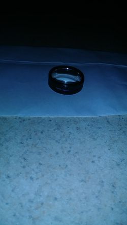 Man's wedding ring size 10 and 1/2 bought from Zales got a nice really pretty boo blue cobalt ring going around it