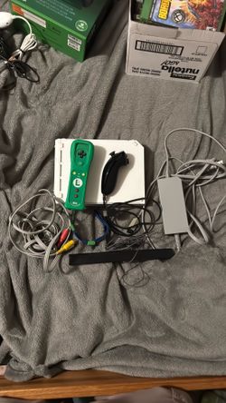 Nintendo Wii console with Luigi controller