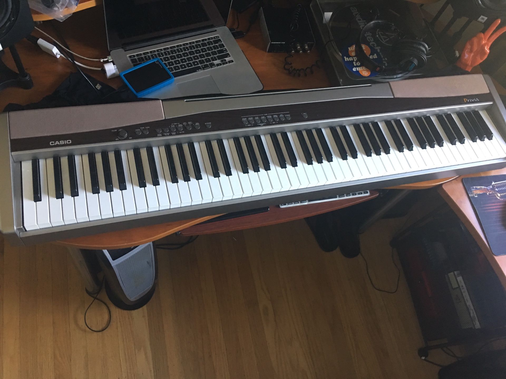 Casio Privia Px-100 digital piano in excellent shape - comes with piano stand. MIDI controller as well