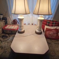 Antique Porcelain Table Lamps With Linen Shades and Brass Finials.