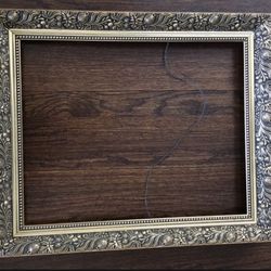 Wood carved frame in antique gold finish