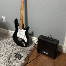 Electric Guitar Comes With Amp, Cord And Tuner