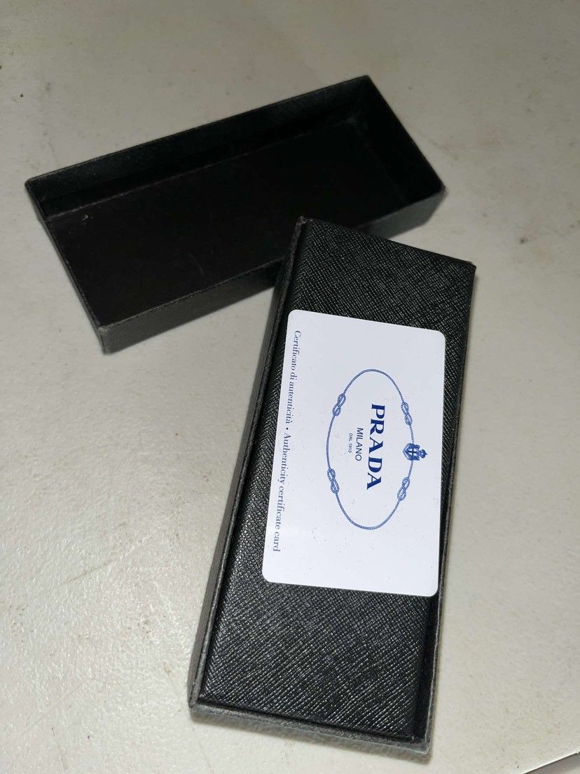 Prada Sunglasses Used As New