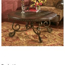 Rafferty Signature Design Brown Round Coffee Table