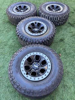 Ford Raptor wheels and 2 good tires