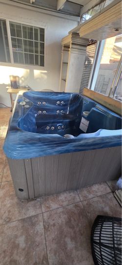 Free 4 person hot tub