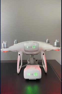 Phantom 4 Pro Drone with Two Batteries, Records 4K and S-Log