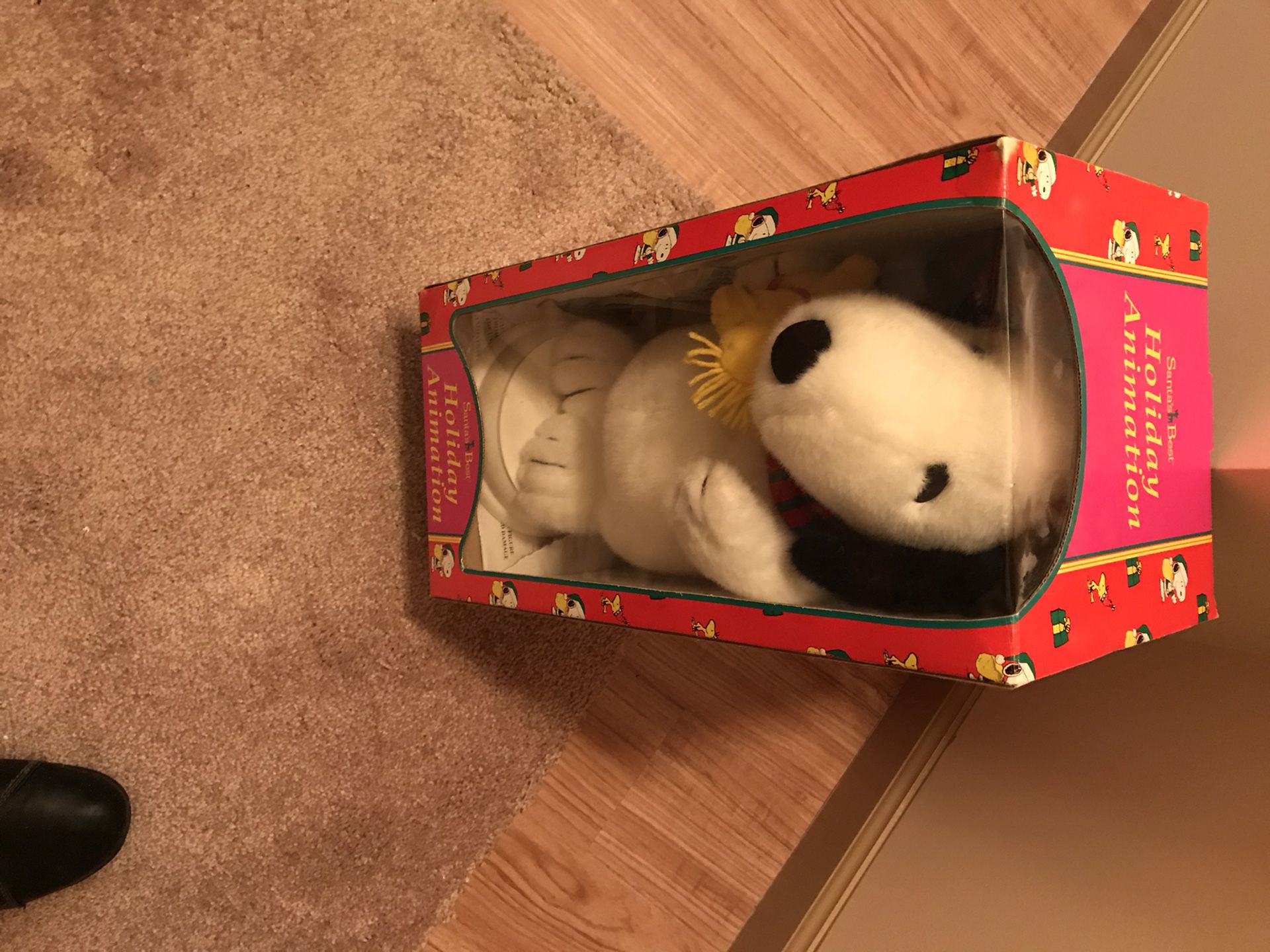 Two snoopy animated dolls