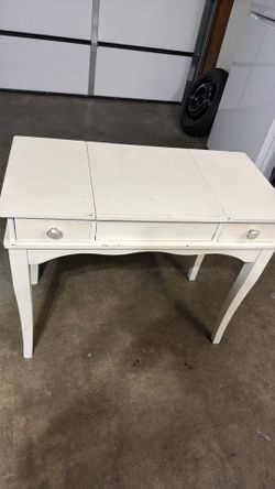Vanity with collapsible mirror