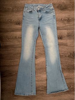 Women’s high rise flared jeans size 4