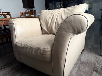 Tan leather chair w/ottoman