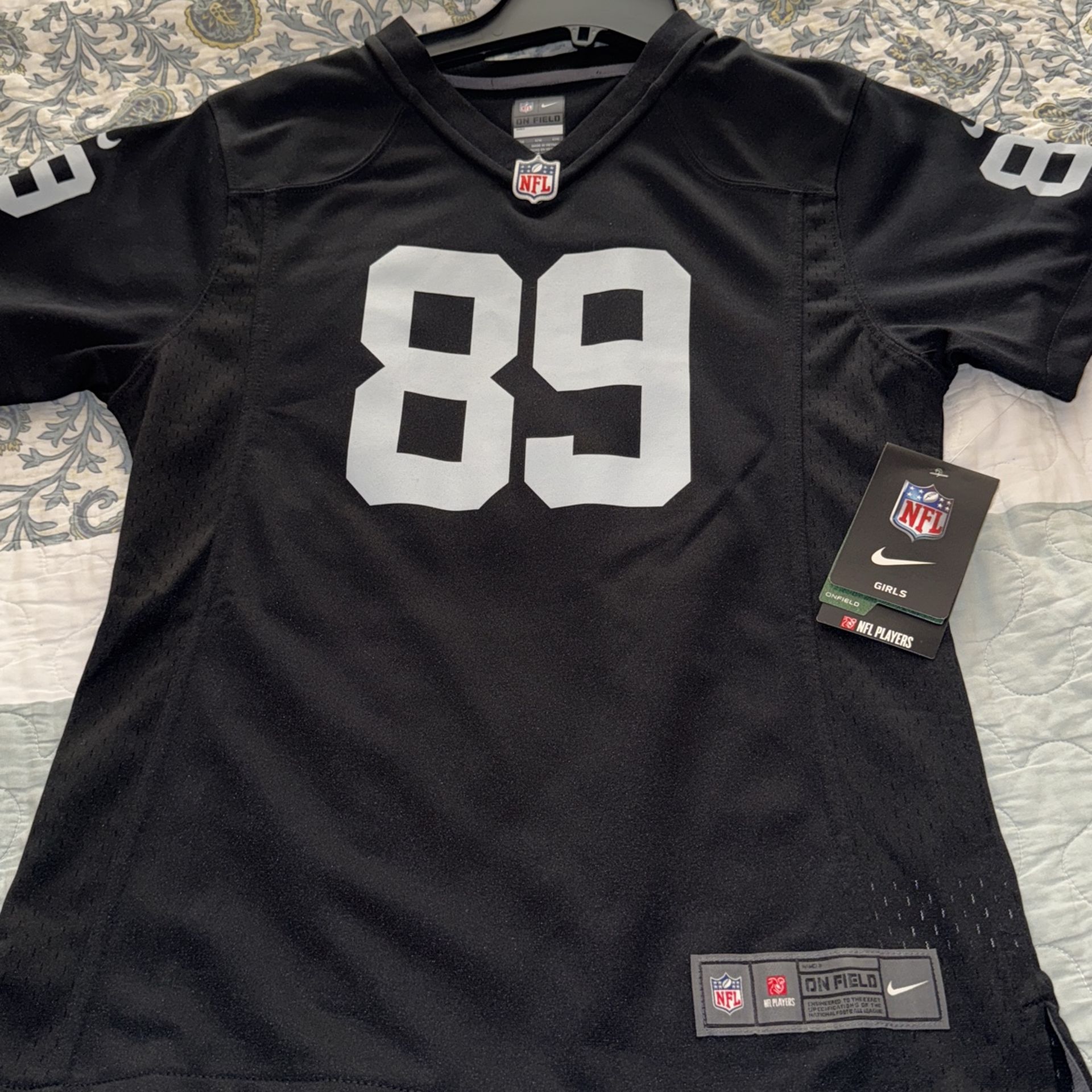 girls raiders football jersey size L-14