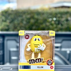 M&M YELLOW METAL FIGURE