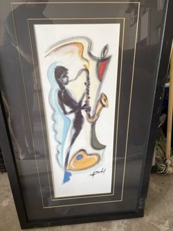 Wall Picture Of Saxophone Player