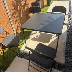 Folding Table and (4) Folding Chairs. Black Color 