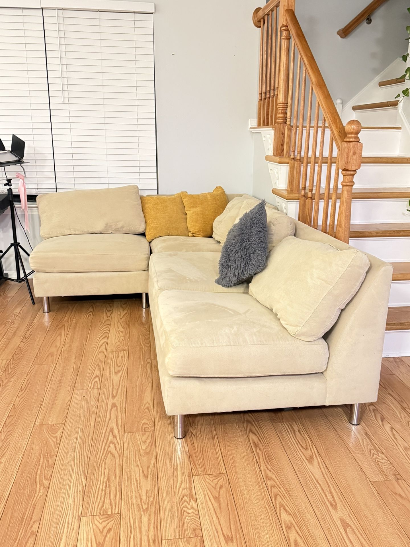 Beige CB2 L Shape Sofa