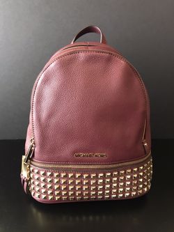 GENTLY USED - Michael Kors (authentic) Leather Backpack - Rasberry/Burgundy with gold studs