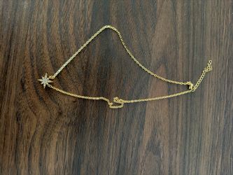 Gold star pendant necklace