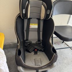 Car Seat And Bag Full Of Soft Toys
