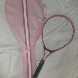 tennis racket with its cover, new