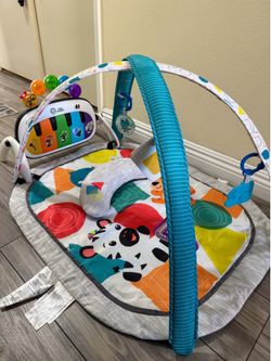 Baby Einstein 4-in-1 Kickin’ Tunes Music and Language Play Gym