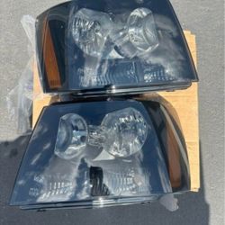 07-14Chevy Tahoe/Suburban Headlights FarosCalaveras Micas Luces