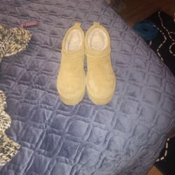 Pair Of Bear paw boots