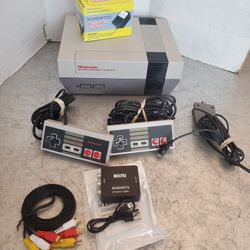 Nintendo Entertainment system NES with 2 controllers, brand new power cord, AV cables & HDMI 