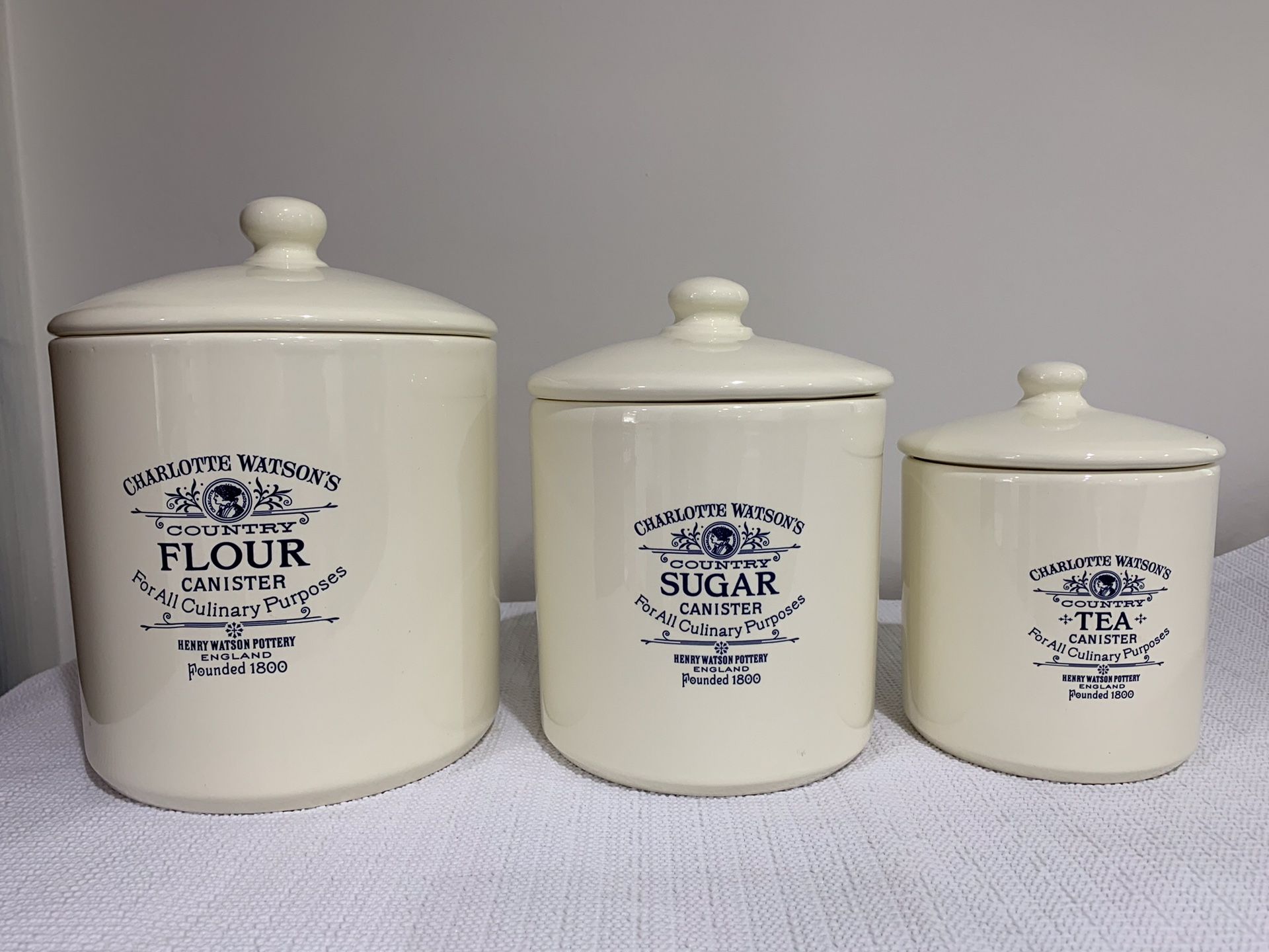 Heavy ceramic kitchen canisters with lids - brand is Williams Sonoma