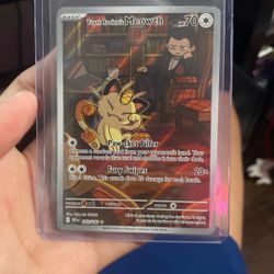 Team rocket’s meowth card