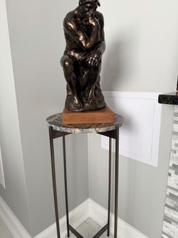 Rodin Thinker statue and stand