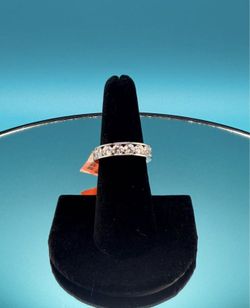 #- 155 Beautiful channel set moissanite band. Size 6