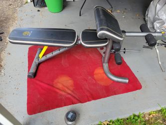 GOLD'S GYM 6 POSITIONS ADJUSTABLE BENCH WITH PREACHER PAD  LEG EXTENSION ATTACHED CURL BAR 
11525 S HALSTED/7111.S WESTERN 
65$  CASH ONLY AS IS