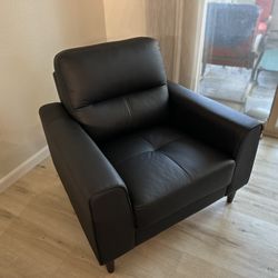 Anslee Black Leather Arm Chair