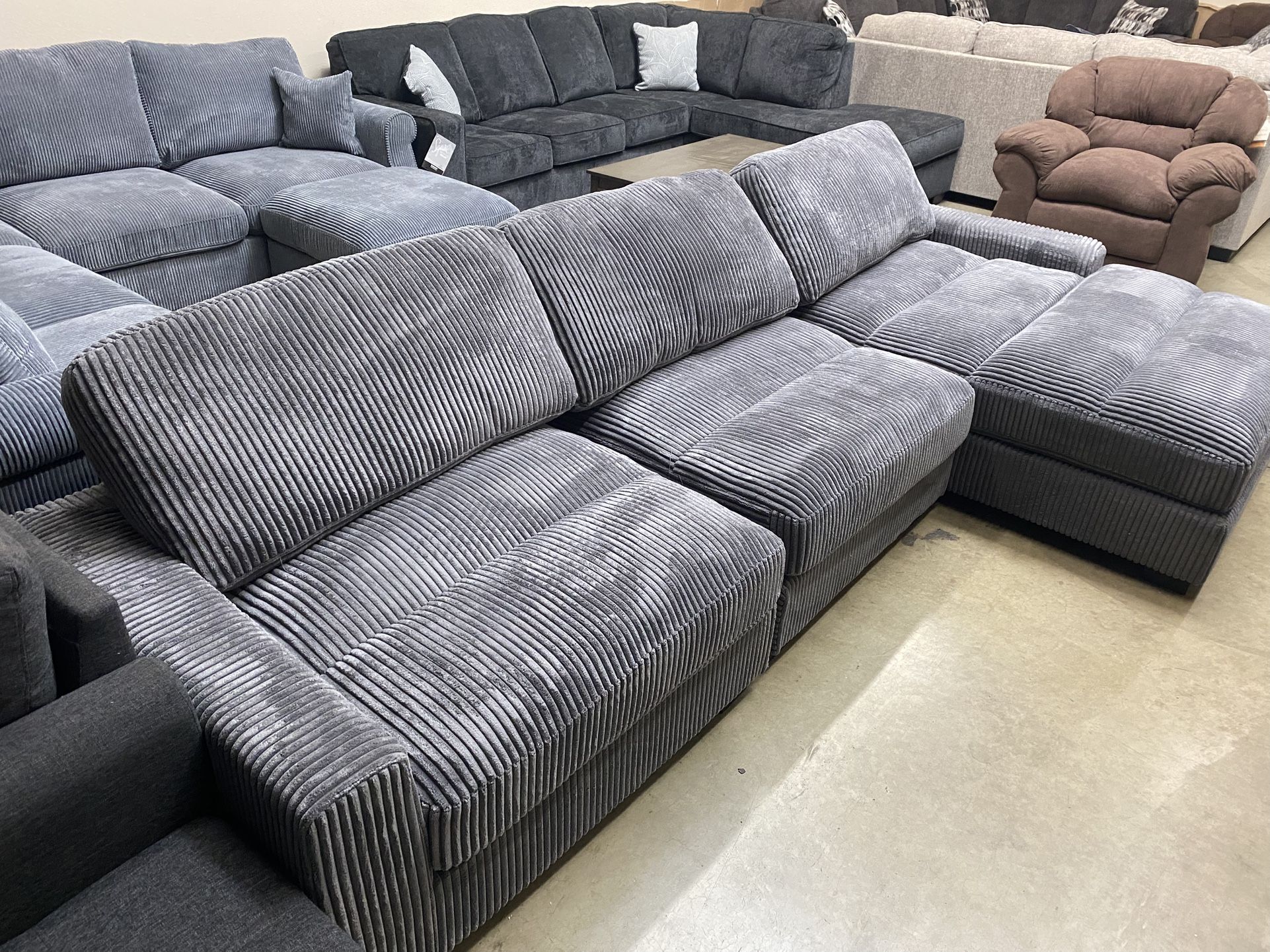 Gray Plush modular Sofa  with wide shareable chaise 127x66 seat depth 40” adjustable backs 3 piece $850 optional pieces available pick up can deliver 