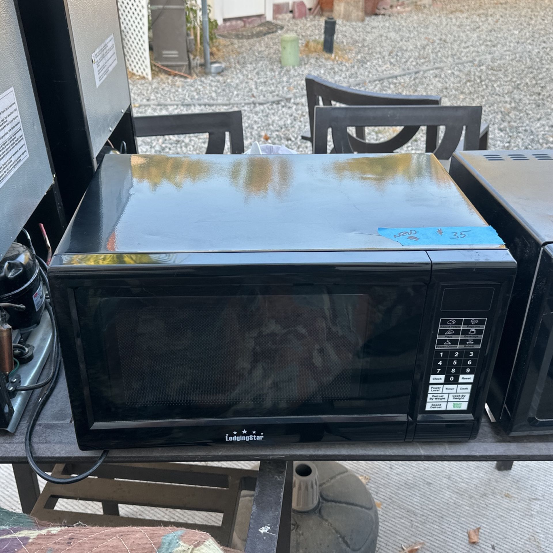 Two microwaves, one new one ! $25 & $35