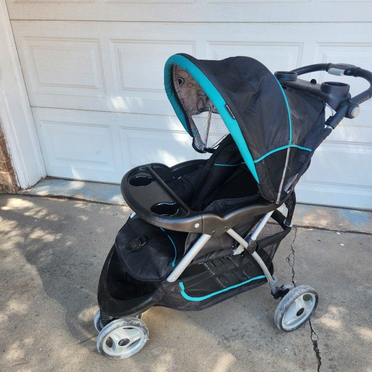 Baby Trend Black And Green Kids Stroller Compatible With Carseat