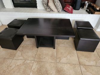 Coffee table with four ottomans