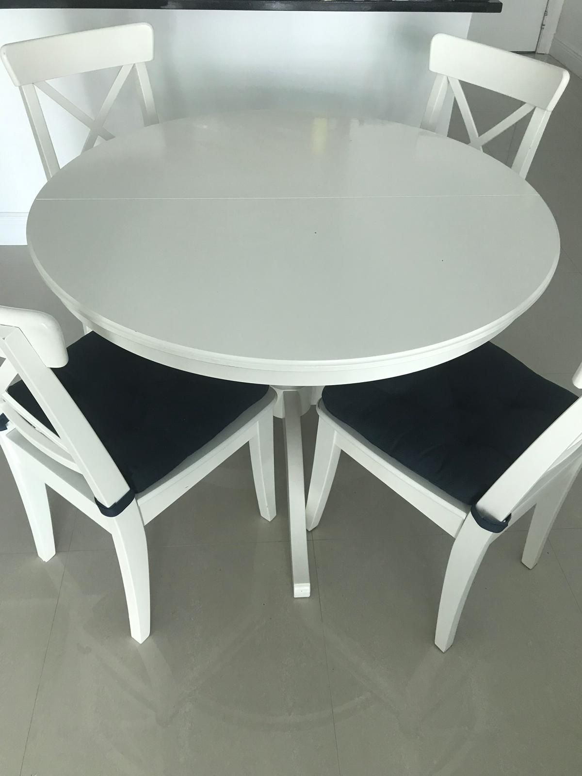 Extendable White Dining Table + 4 Chairs