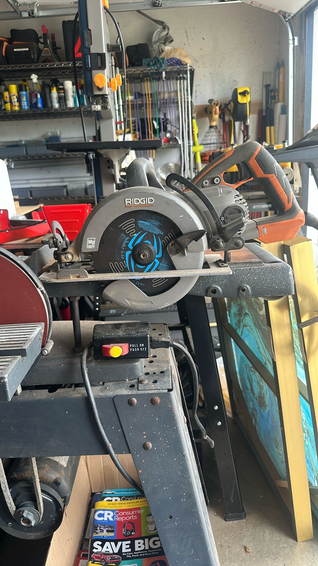 Flat belt, disc grinder and a worm drive Ridgid 7 1/4 inch saw