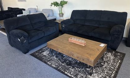 Black sofa and loveseat