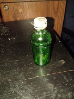 Green jjar with lid
