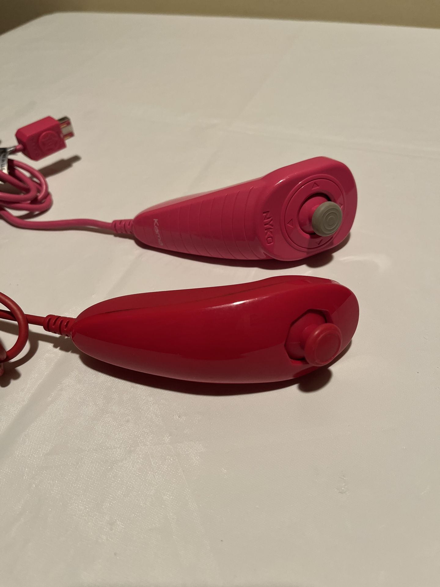 Two Nintendo Wii Nunchuk Controllers